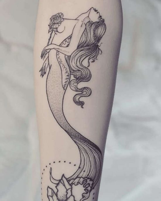 Zeemeermin tattoo betekenis & 42 tattoo ideeën